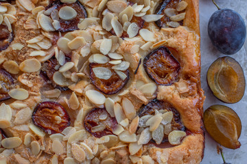 home made sweet rustic plum cake on a table
