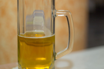 Glass of beer on the table