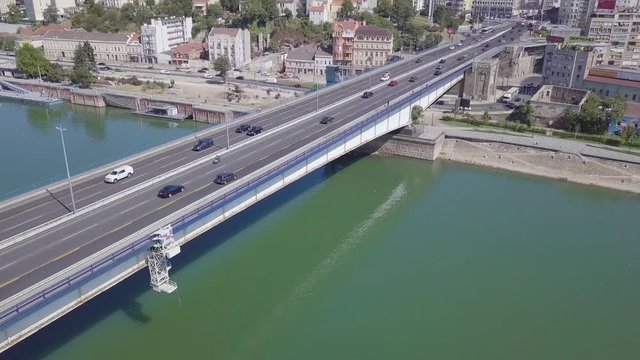 Stunning revealing 4k shot of Belgrade downtown river Sava and Branko bridge