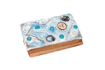 White magic book isolated on white background.