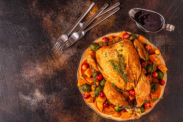 Served roasted turkey / chicken with vegetables.