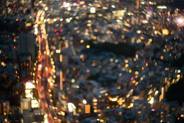 Abstract blur urban city street road  and lighting bokeh for background, view of Tokyo, Japan