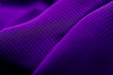 texture of the satin fabric of lilac color for the background.