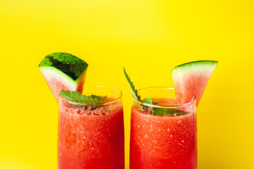 Vitamin watermelon smoothie for vegans on a yellow background. Super food for detox