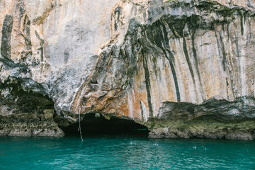 Fototapeta premium Small limestone island in the ocean, Thailand. 