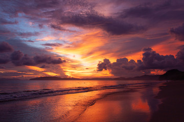 Beautiful vivid sky over the beach scenery with sea view, clouds, and waves. Nature beauty composition.