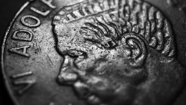 Close up of a detailed old coinso;iu