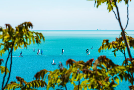 Gulf of Trieste. High cliffs Between boats, karst rocks and ancient castles. Duino. Italy