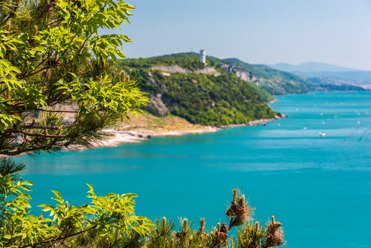 Gulf of Trieste. High cliffs Between boats, karst rocks and ancient castles. Duino. Italy