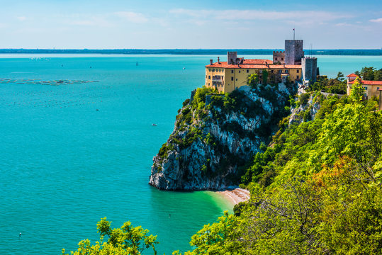 Gulf of Trieste. High cliffs Between boats, karst rocks and ancient castles. Duino. Italy