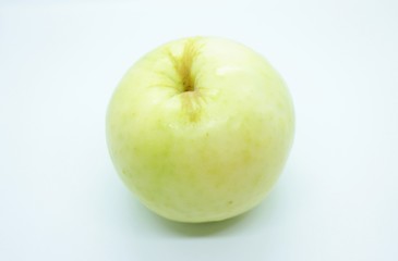 Green apple located on a white background