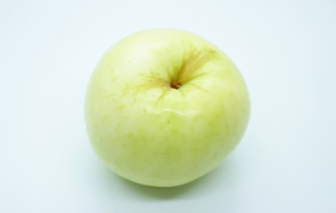 Green apple located on a white background