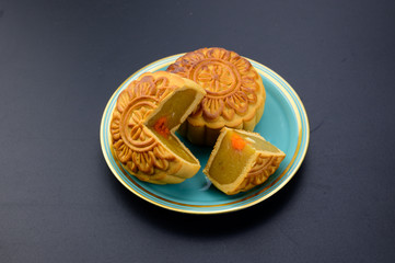 Mid-Autumn Festival moon cakes dish  on black table