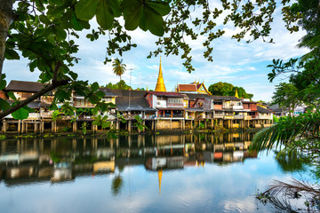 Fototapeta premium Classical Village near river, Chanthaburi Old Town Waterfront ,Landmark with old building village in Chanthaburi Thailand.