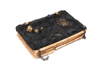 Black magic book isolated on white background.