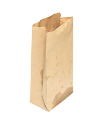 Paper bag with spots of fat on a white background.