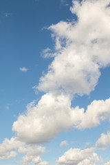 Blue sky with white clouds. Wallpaper.