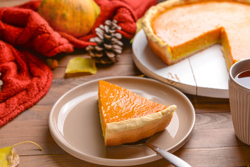 Fototapeta na wymiar Fresh tasty pumpkin pie on table