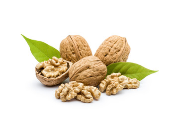 open walnut closeup with leaves on white background