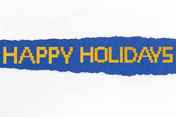 Happy Holidays. Ripped paper. Bricks toys Background