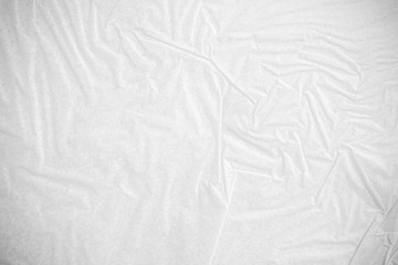 White crumpled paper close up texture background