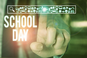 Conceptual hand writing showing School Day. Concept meaning starts from seven or eight am to three pm get taught there Woman wear work suit presenting presentation smart device