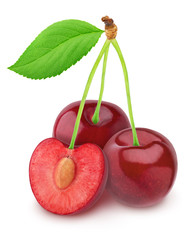 Whole and halved cherries isolated on a white.