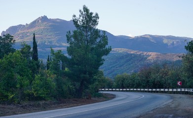 Mountain highway at sunset