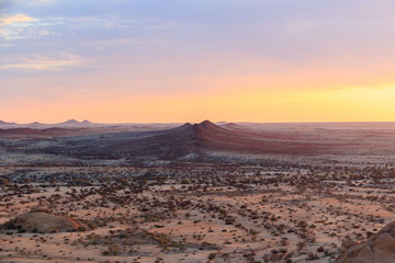 The vastness of Spitzkoppe nature reserve during sunset, Namibia, Africa