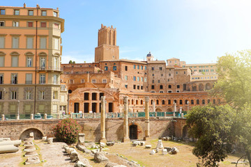 Forum and Market of Trajan in Rome, Italy. Famous old Trajan Forum is one of the main tourist attractions in the city. Ancient Roman architecture and ruins of Trajan's area in summer.