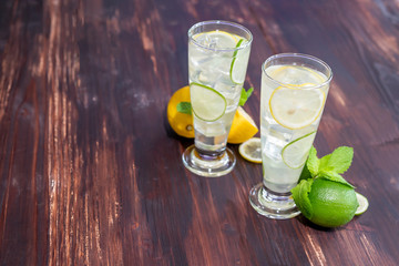 View of the top of a lemon glass on a wooden floor