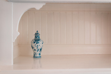 Pots in cupboard in kitchen