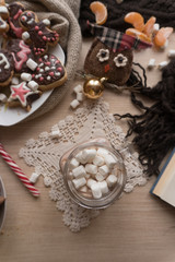 Glass of cocoa with marshmallow flatlay top down view. Christmas decoration concept.