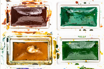 Set watercolor paints with paintbrush. Art concept