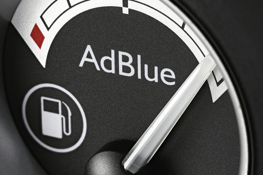 GERMANY - APRIL 12, 2019: AdBlue fuel gauge in truck dashboard - full. AdBlue is a registered the trademark of the German Association of the Automotive Industry (VDA).