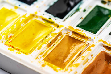 Set watercolor paints with paintbrush. Art concept