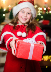 Winter season sale. Shopping and discount. Christmas is time for giving. Festive atmosphere christmas day. Girl santa claus costume hold christmas gift box. Buy gift now. Open gift. Happy moments
