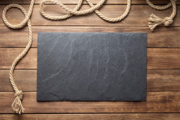 ship rope at wooden board background