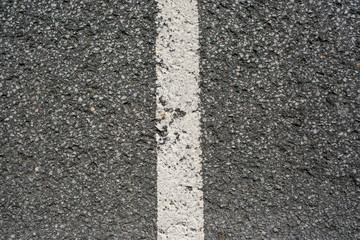 white stripe on the pavement