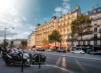 Streets of Paris, France. Blue sky, buildings and traffic. Shot in october daylight.