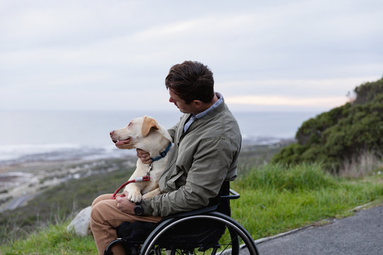 Disabled man in a wheelchair enjoying a day out
