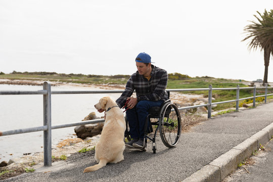 Disabled man in a wheelchair enjoying a day out