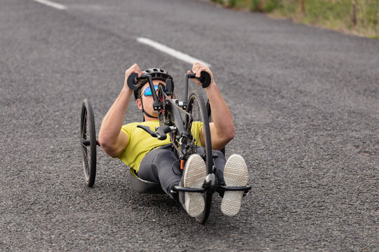 Man cycling on recumbent bicycle