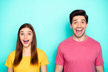 Fototapeta na wymiar Close-up portrait of his he her she nice attractive overjoyed glad cheerful cheery couple expressing positive emotion isolated over bright vivid shine vibrant green blue turquoise background