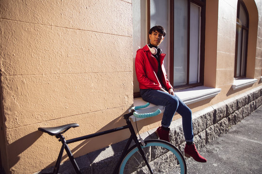 Young transgender adult in the street