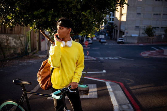Young transgender adult in the street