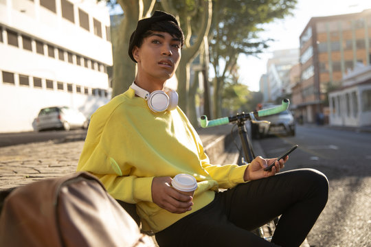 Young transgender adult in the street