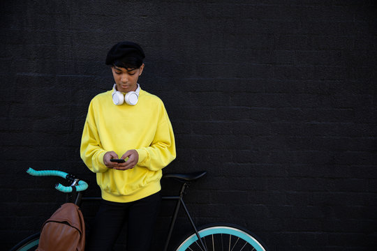 Young transgender adult in the street