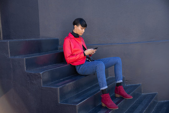 Young transgender adult in the street