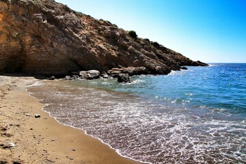 Fototapeta na wymiar Beautiful lonely Portus beach in Cartagena, Murcia